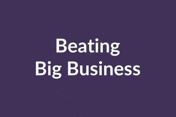 zensmart is showing The image has a purple background with the text "Beating Big Business" written in bold, white font at the center, reminiscent of an auto draft heading. with print workflow automation