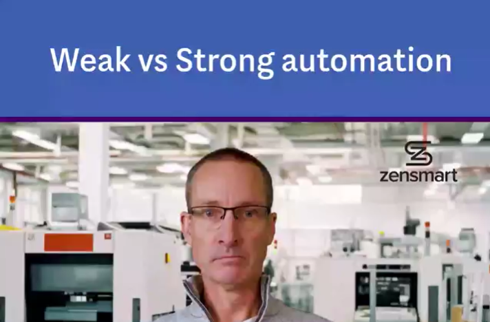 zensmart is showing A man wearing glasses stands in a modern factory with machinery in the background. Text above reads, "Weak vs Strong Automation," highlighting key differences in automation. The Zensmart logo is visible, emphasizing this informative Automation Video. with print workflow automation